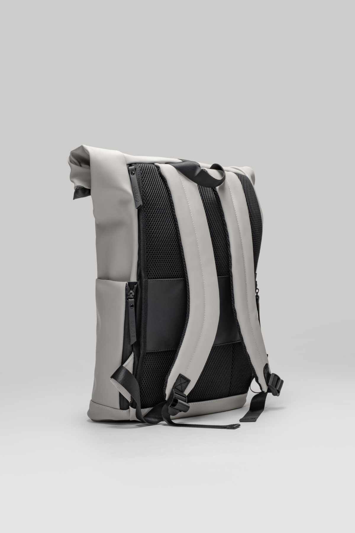 Gray and black backpack on a light gray background