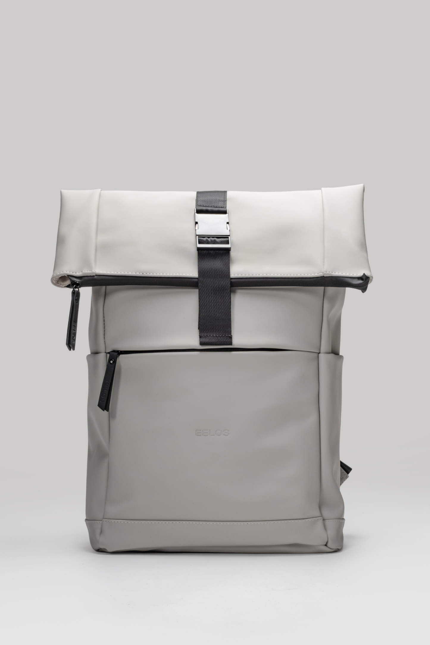 Gray roll-top backpack with black straps on a light gray background