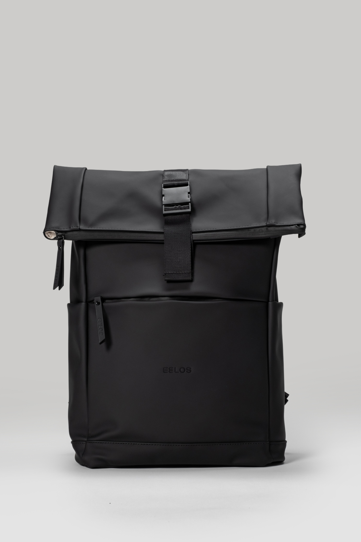 Black backpack with a visible brand logo on a light gray background