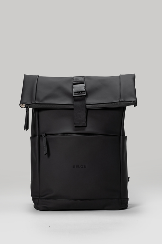 Black backpack with a visible brand logo on a light gray background